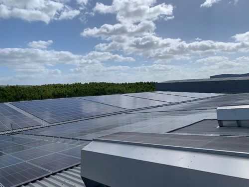 Solar panels on factory roof