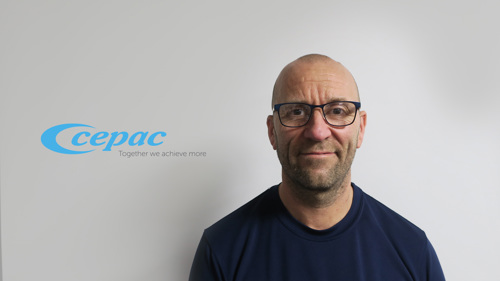 Portrait of Keith with Cepac logo in background.